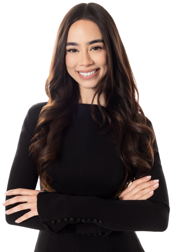 Blake Friedman smiling with his arms crossed