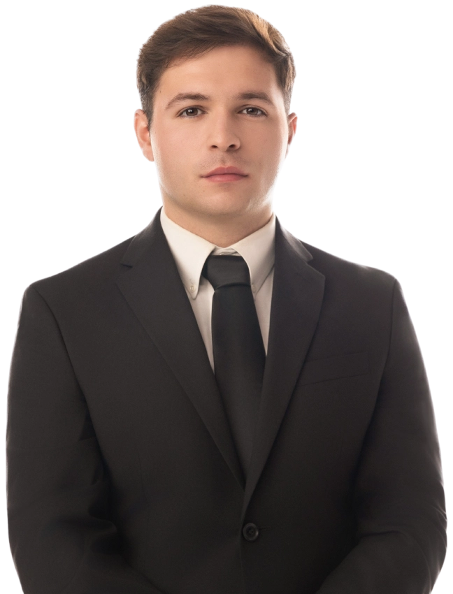 Blake Friedman smiling with his arms crossed