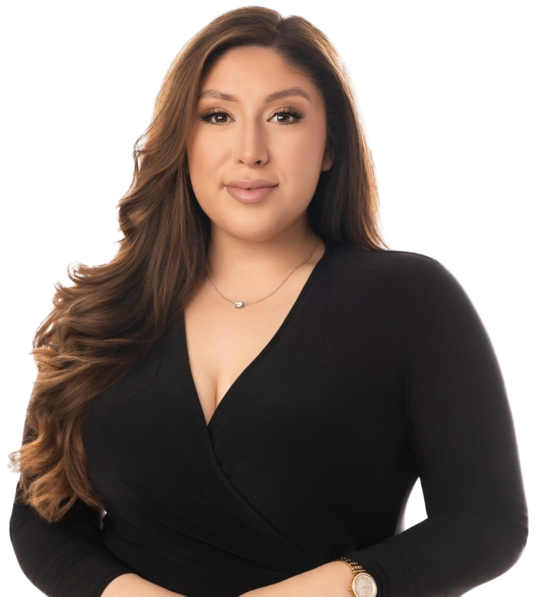 Blake Friedman smiling with his arms crossed