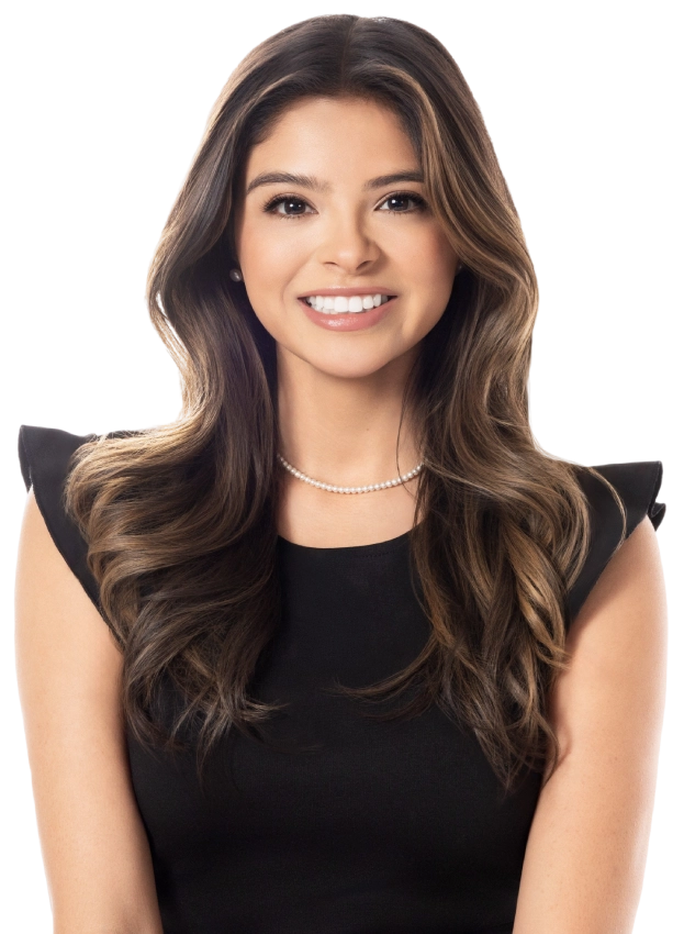 Blake Friedman smiling with his arms crossed