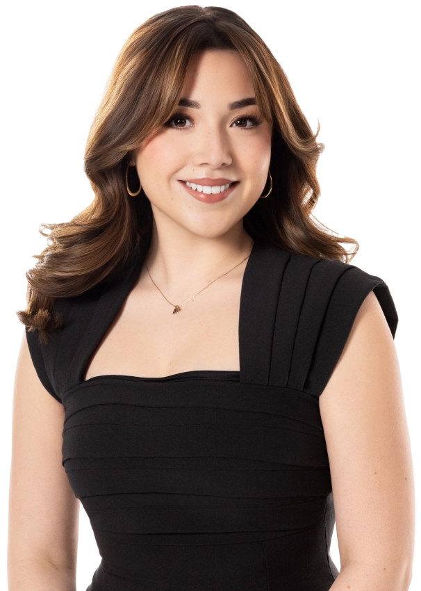 Blake Friedman smiling with his arms crossed